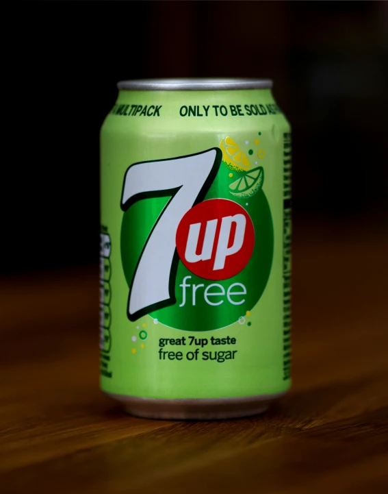 a can of 7up on a wooden table, a picture, by David Simpson, unsplash, square, carefree, infused with zerg hydralisk, lime green