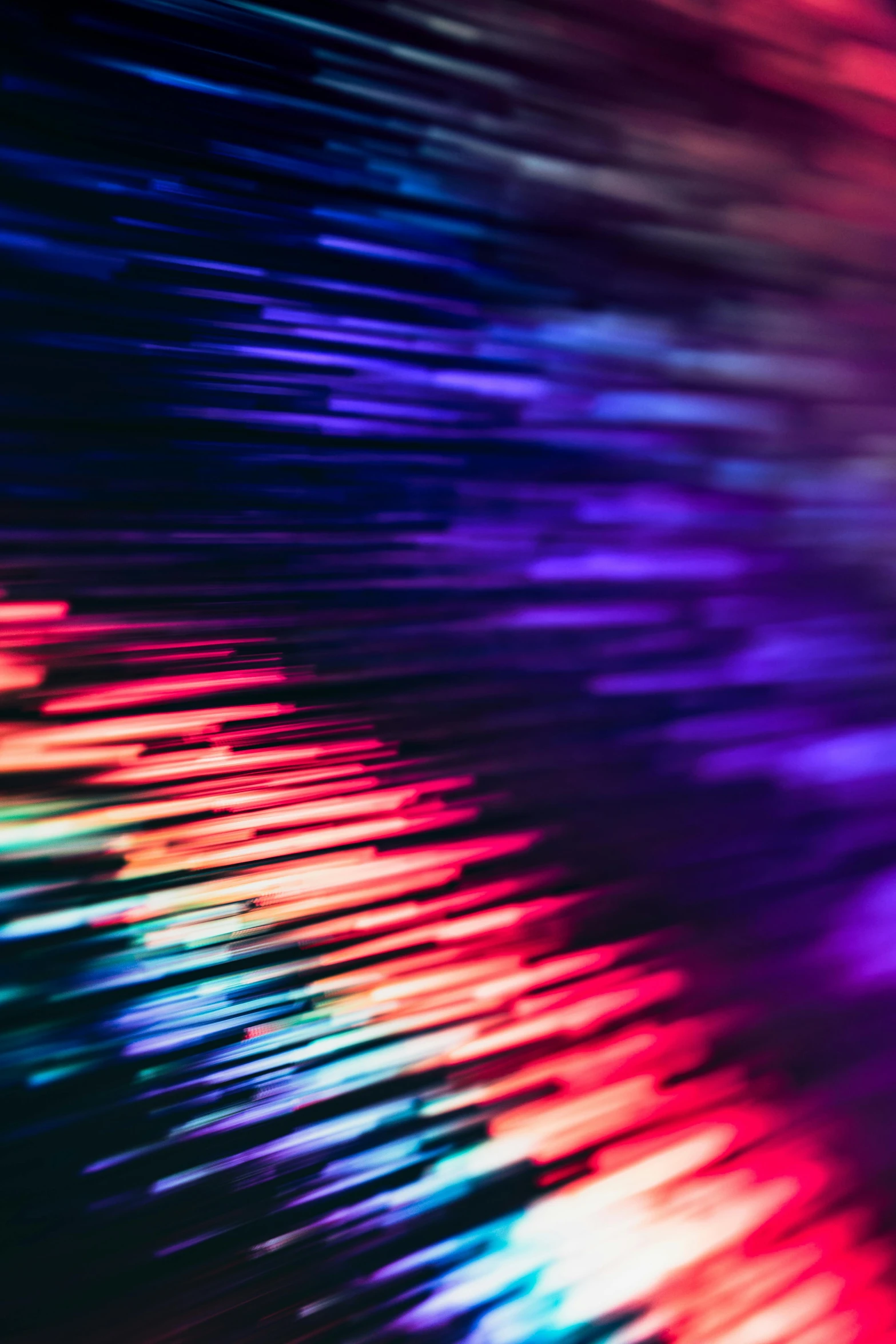 a blurry image of colorful lights on a black background, a microscopic photo, by Rachel Reckitt, unsplash, thin straight purple lines, vibrant 3d textures, fiberoptic hair, red blue purple black fade