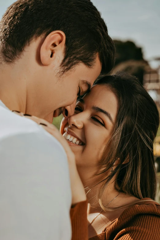 a man and woman standing next to each other, pexels contest winner, happening, cute seductive smile, upclose, embracing, cheeks