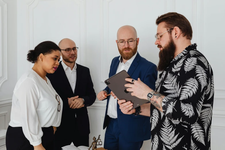 a group of people standing around a cake, by Adam Marczyński, pexels contest winner, in the office, avatar image, demna gvasalia, wearing a suit and glasses