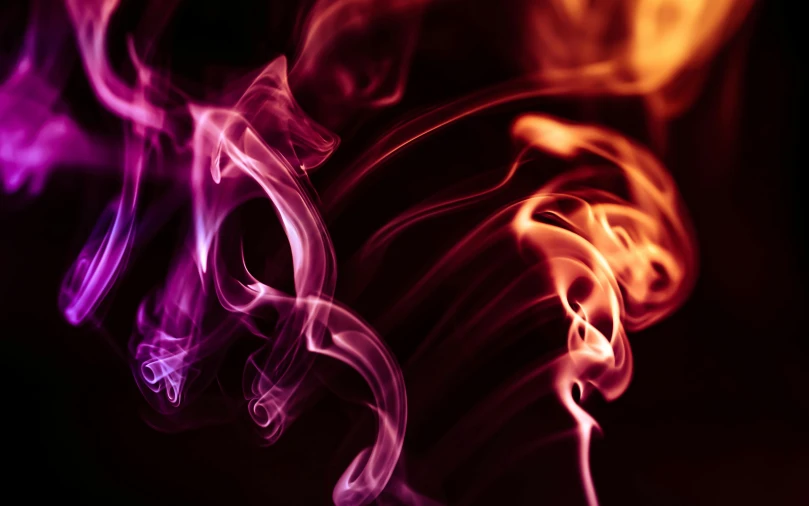 a close up of smoke on a black background, pexels, some red and purple and yellow, instagram post, some purple and orange, flare