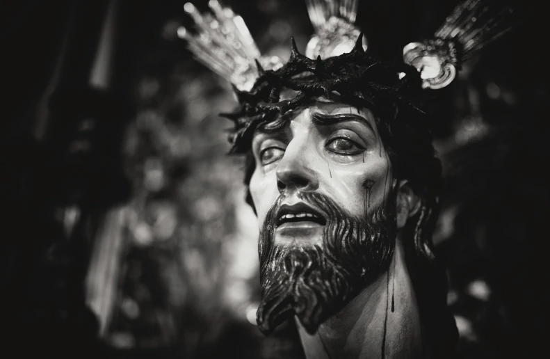 a statue of jesus wearing a crown of thorns, a black and white photo, by Adam Marczyński, pexels contest winner, carnival, michael hussar, portrait of a old, holy
