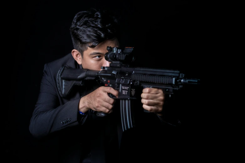 a man in a suit holding a gun, pexels contest winner, ultra realistic ar 16:9, various poses shooting photos, sayem reza, foam