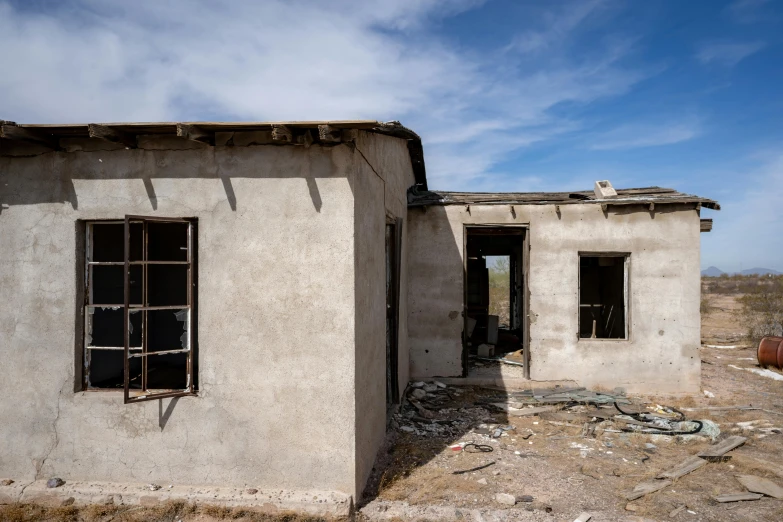 an abandoned building in the middle of nowhere, a portrait, by Daniel Lieske, arte povera, color image, mexican standoff, thumbnail, high resolution photo