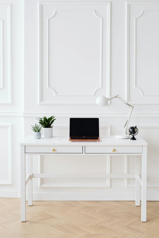 a white desk with a laptop on top of it, trending on pexels, in style of classicism, detailed product image, interior white wall, technical