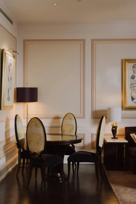 a living room filled with furniture and a painting on the wall, inspired by Georges Emile Lebacq, baroque, hotel room, dining table, graphic detail, taken in the late 2010s
