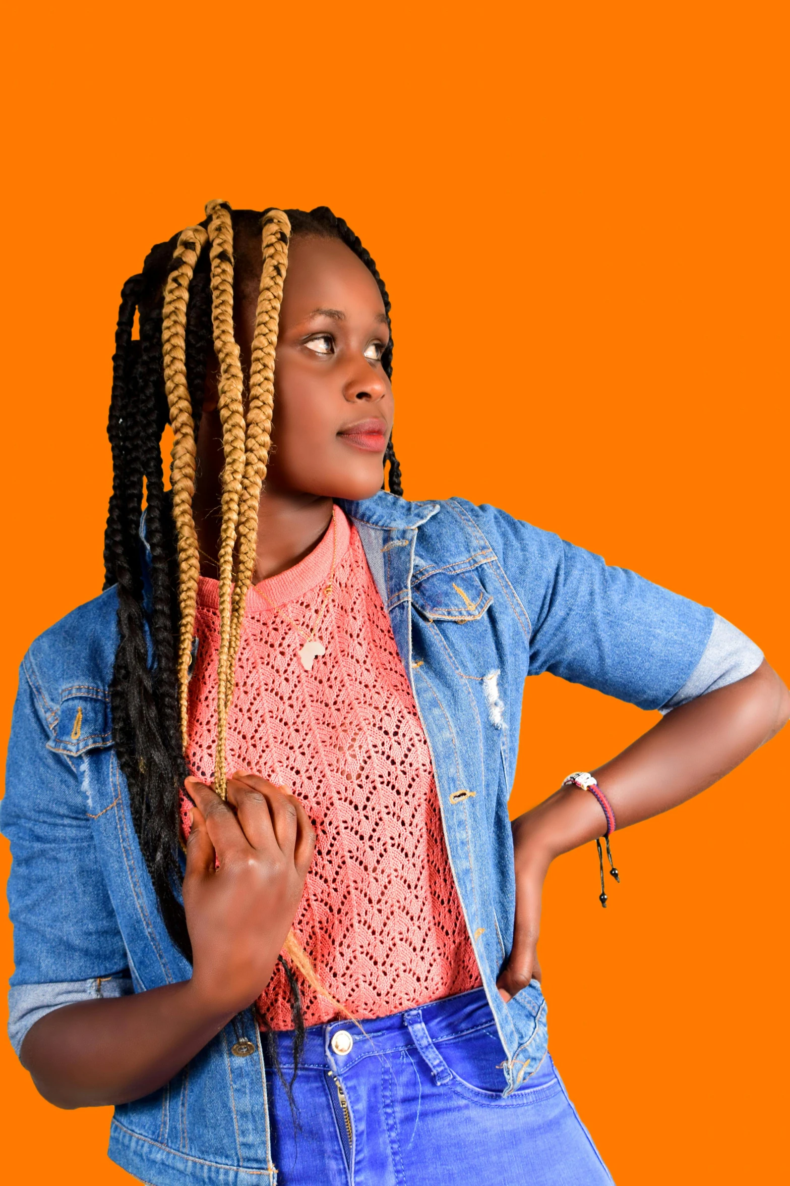 a woman standing with her hands on her hips, an album cover, by Chinwe Chukwuogo-Roy, pexels contest winner, orange braided hair, headshot profile picture, teenage girl, orange shoulder pads