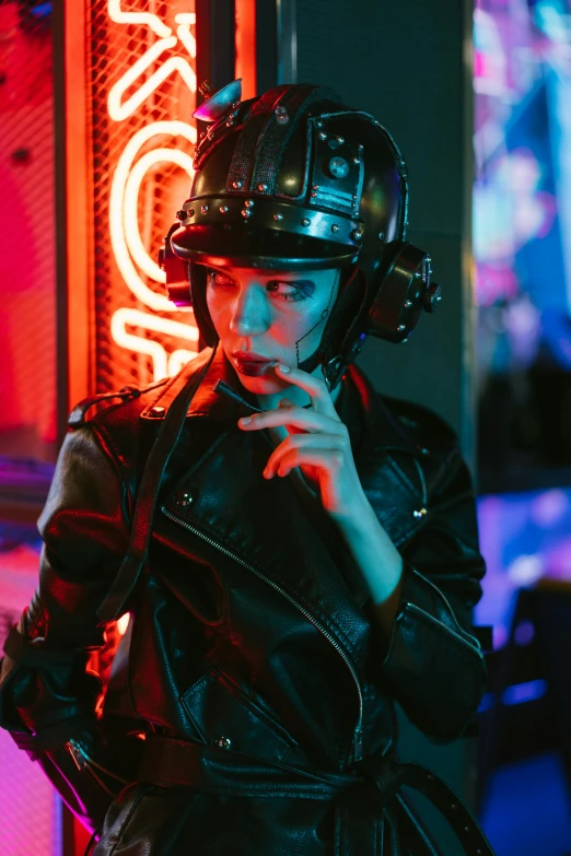 a woman wearing a helmet standing in front of a neon sign, cyberpunk art, trending on pexels, leather pilots uniform, smoke coming out of her mouth, androgynous person, nightclub