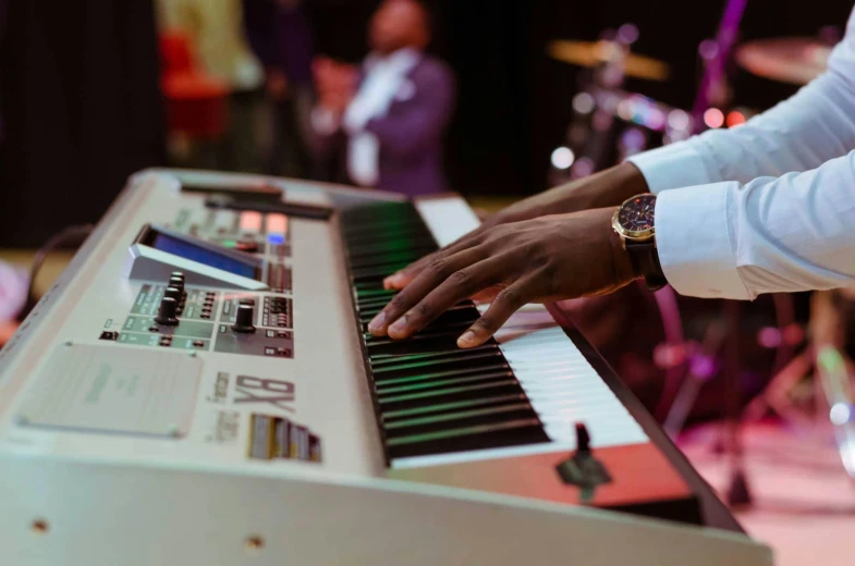 a close up of a person playing a keyboard, emmanuel shiru, wearing presidential band, beautiful visuals, instagram picture