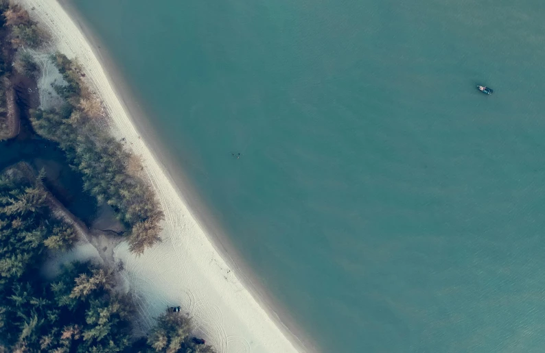 an aerial view of a beach and a body of water, a screenshot, pexels contest winner, hunting, simplistic, flight