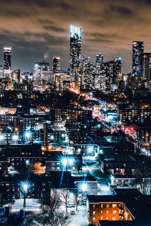 an aerial view of a city at night, pexels contest winner, toronto city, ultrawide cinematic, gif, stacked image