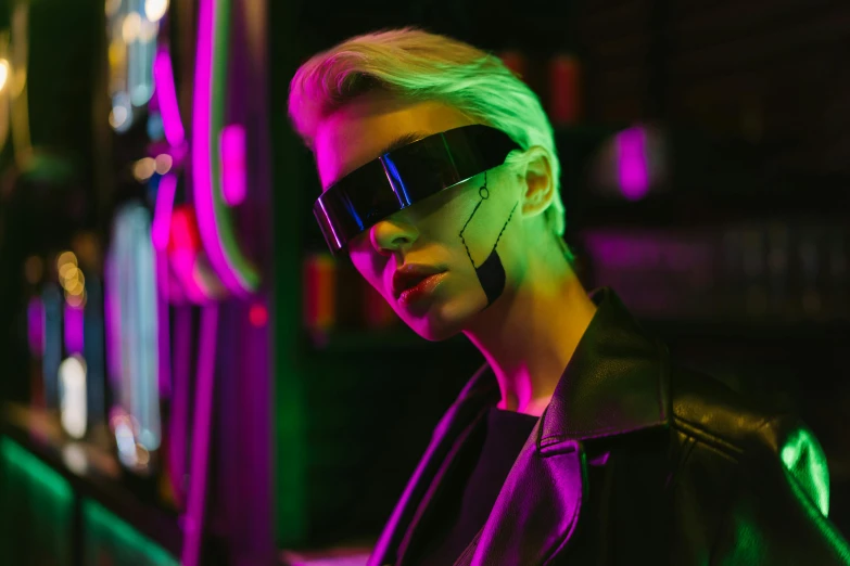 a close up of a person wearing sunglasses, cyberpunk art, trending on pexels, with neon visor, attractive androgynous humanoid, xqc, sci-fi night club