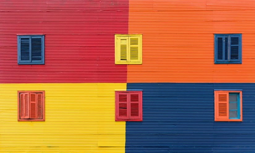 a multicolored building with multiple windows and shutters, a pop art painting, by Jan Rustem, pexels contest winner, minimalism, chile, alexey egorov, some red and yellow, painting for a wall