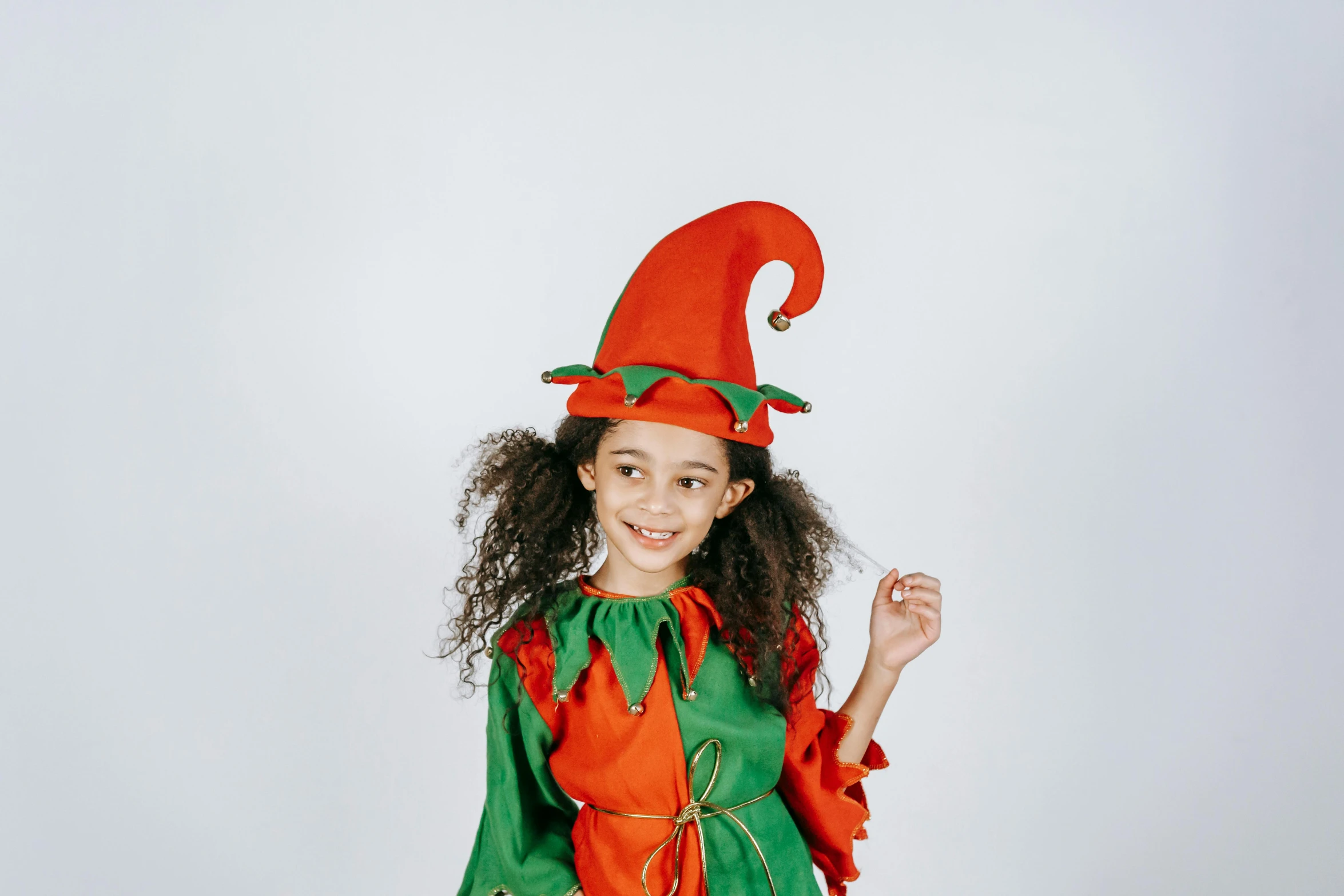 a little girl dressed in an elf costume, pexels, renaissance, she has olive brown skin, character with a hat, teen girl, full product shot