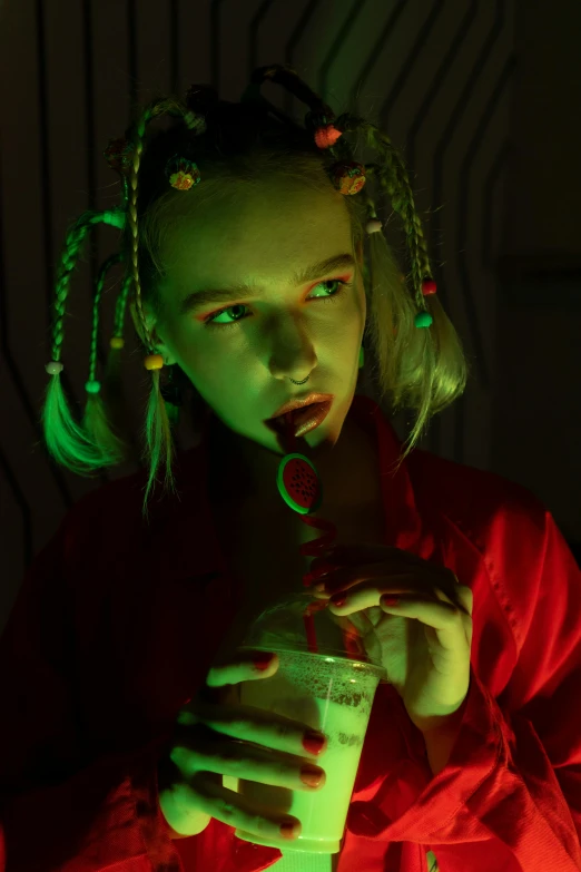 a close up of a person holding a drink, cyberpunk art, inspired by Elsa Bleda, neo-dada, pigtails hairstyle, an ewok eating a lollipop, julia garner, red and green lighting