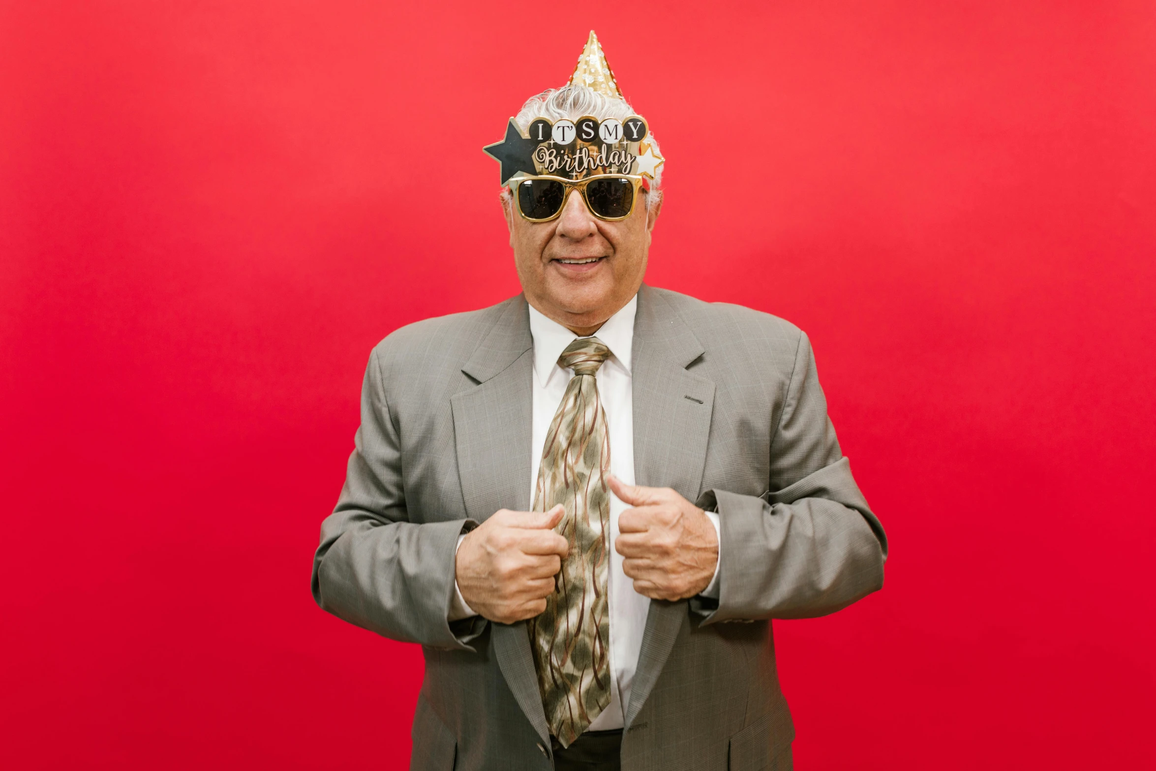 a man wearing a party hat and sunglasses, unsplash, stuckism, portrait of danny devito, chrome mask, red forman, fully dressed