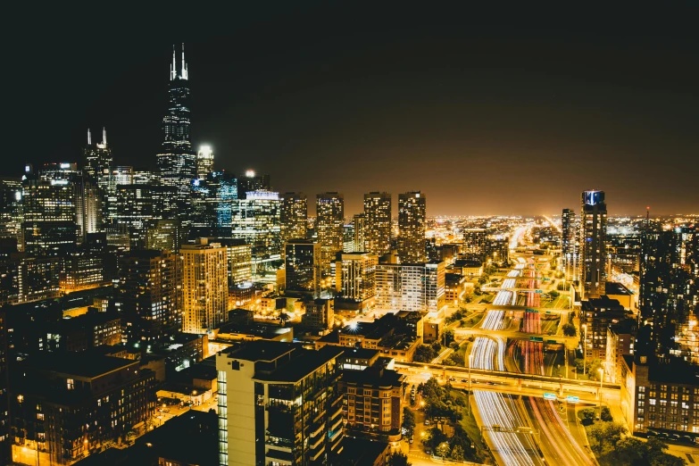 an aerial view of a city at night, pexels contest winner, modern chicago streets, instagram photo, high resolution image, 1 4 9 3