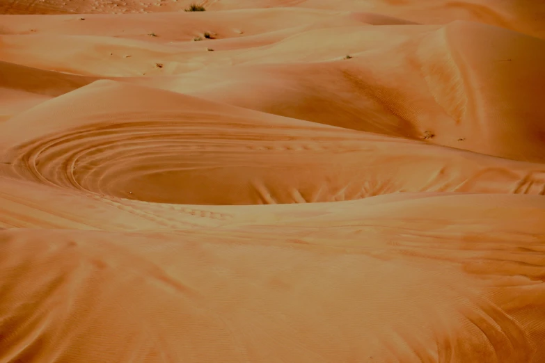 a person riding a horse in the desert, orange hue, floating spiral sand, visible veins, youtube thumbnail