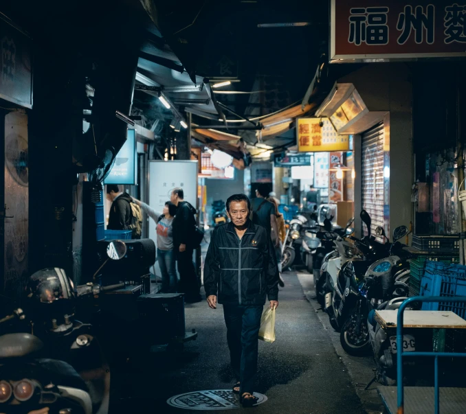 a man walking down a street next to parked motorcycles, a portrait, pexels contest winner, shin hanga, neon lights above shops, maze of streets, conde nast traveler photo, like jiufen