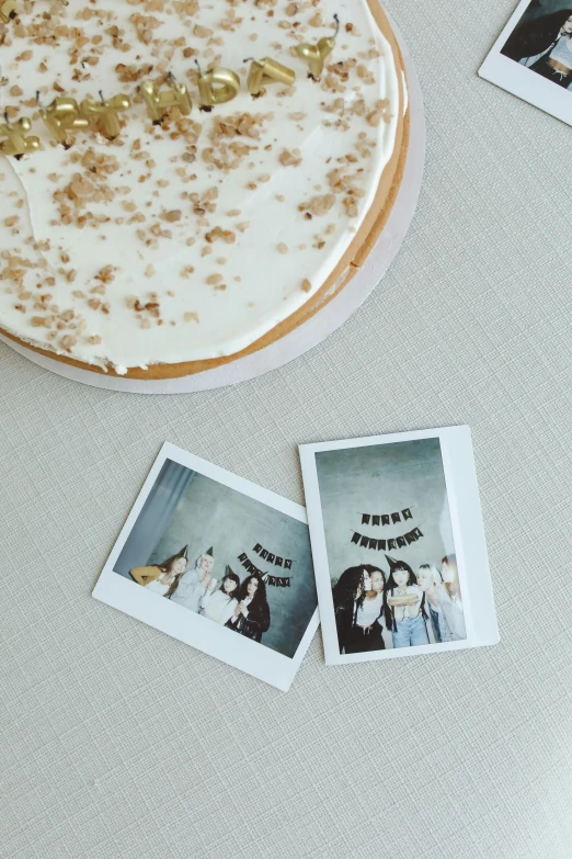 a cake sitting on top of a white table, a polaroid photo, happening, stickers, indoor picture, good times, full product shot