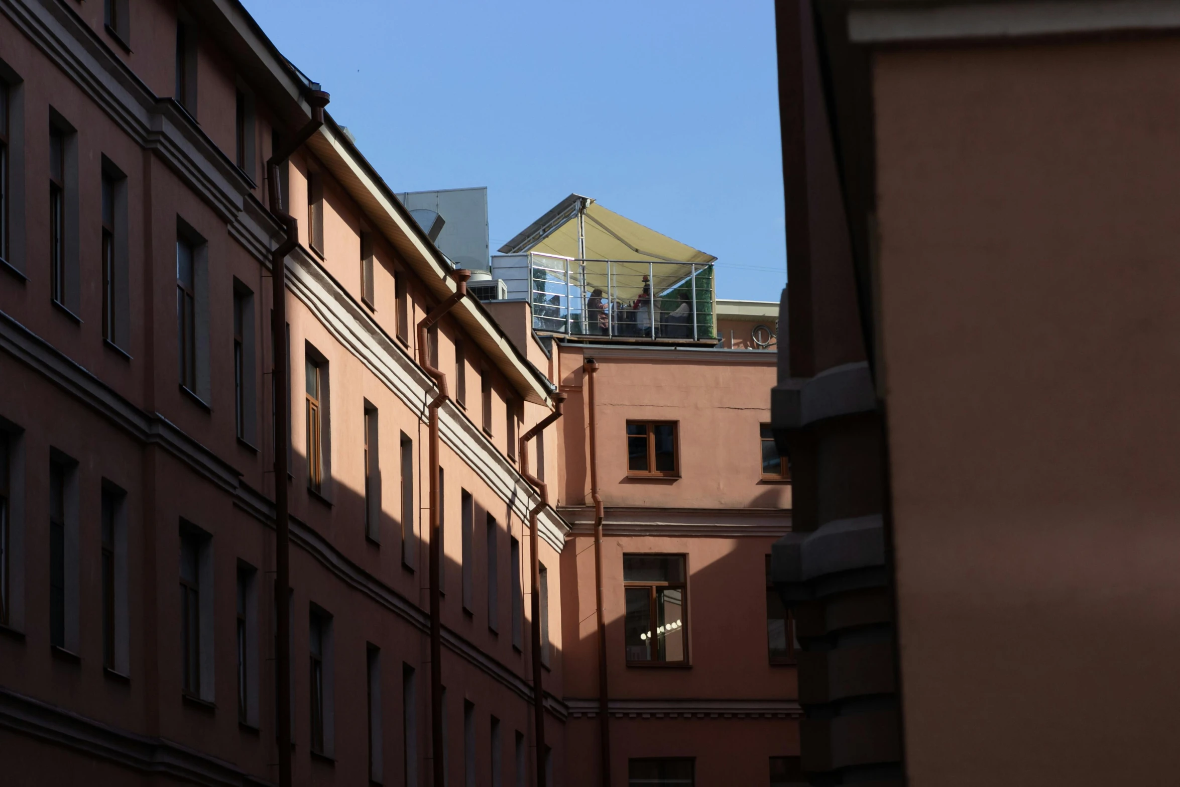 a couple of buildings that are next to each other, inspired by Anna Füssli, unsplash, temporary art, rooftop, saint petersburg, gigapixel photo
