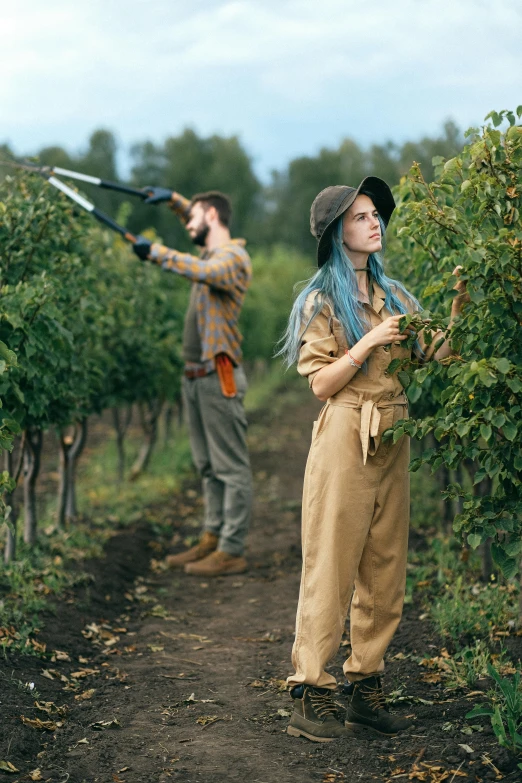 a couple of people that are standing in the dirt, inspired by Jules Bastien-Lepage, pexels contest winner, renaissance, hanging vines, wearing human air force jumpsuit, holding an axe, inspect in inventory image