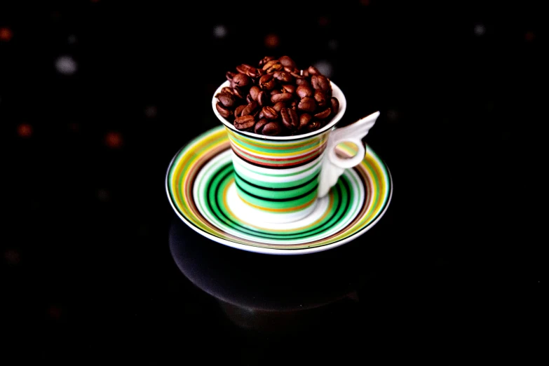 a cup filled with coffee beans on top of a saucer, vivid lines, thumbnail, mini model