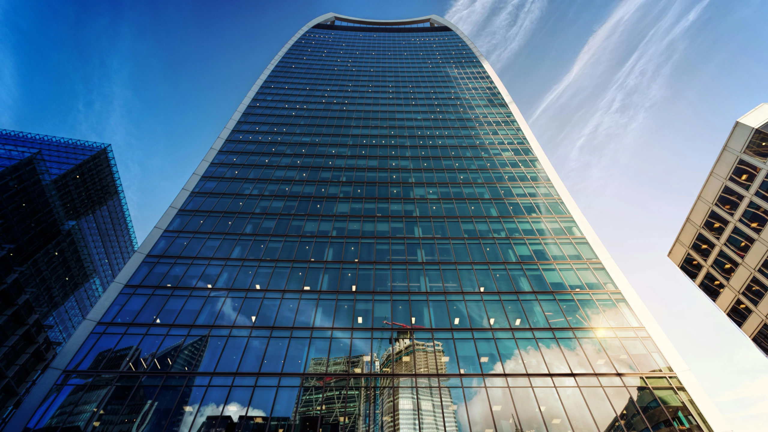 a very tall building with a lot of windows, inspired by Richard Wilson, pexels contest winner, curvy build, grimshaw, square, uhq