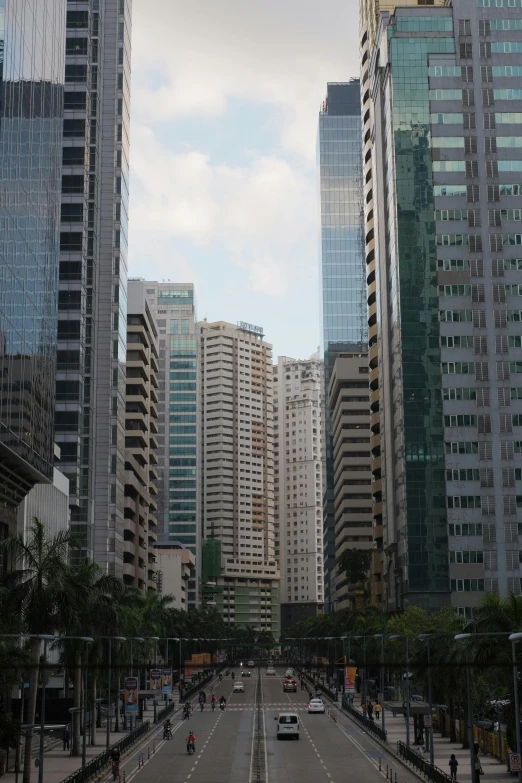 a city street filled with lots of tall buildings, manila, jc park, extra detail, tall minimalist skyscrapers