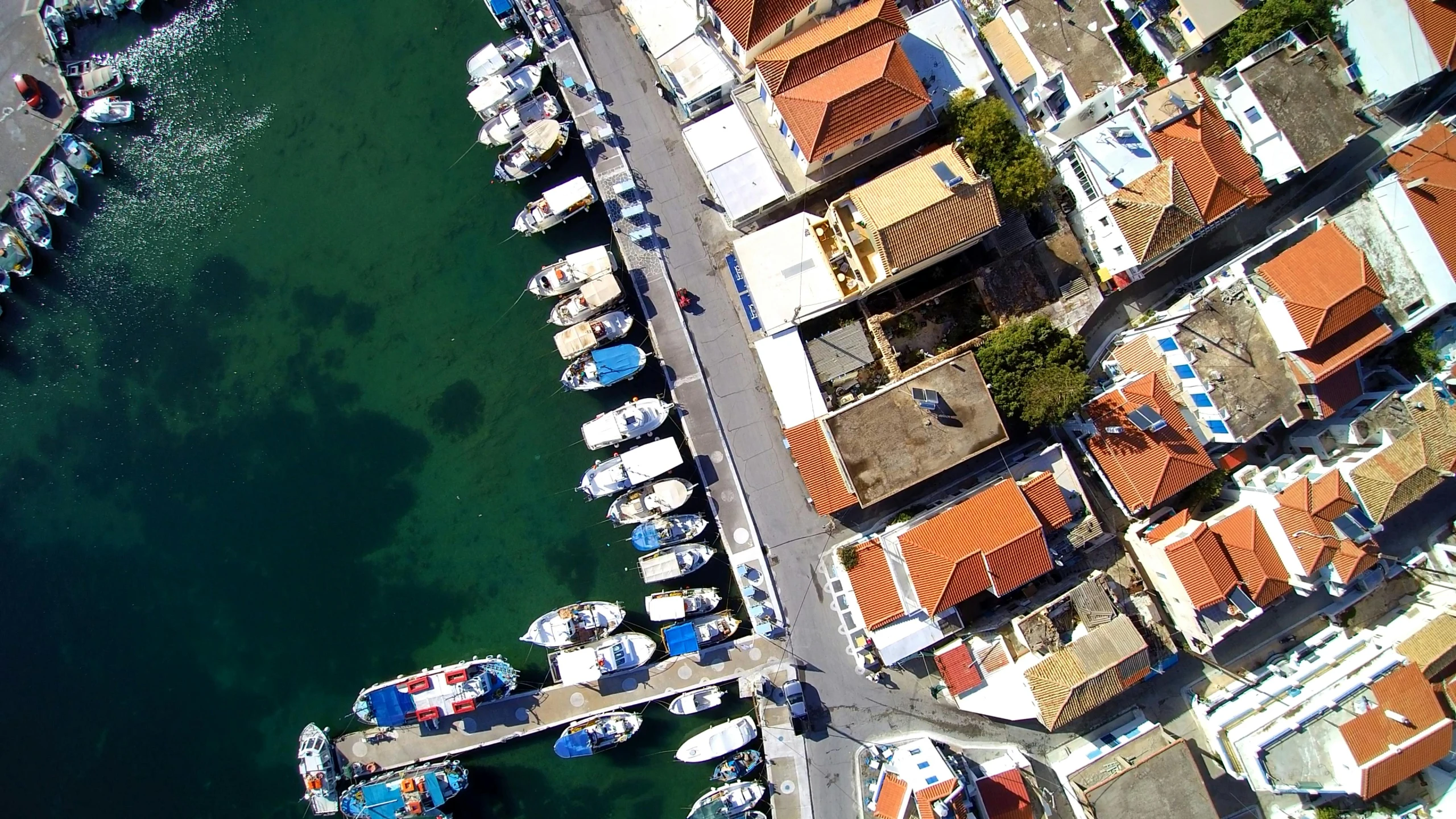 a marina filled with lots of boats sitting next to each other, pexels contest winner, photorealism, greek nose, mid air shot, square, thumbnail