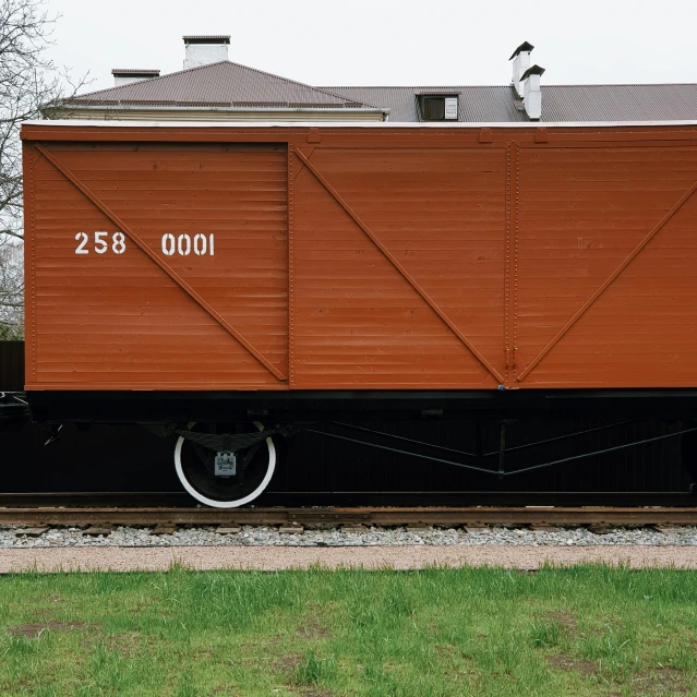 a train car sitting on top of a train track, by Attila Meszlenyi, temporary art, hegre, zdislav beksinsk - h768, brown, preserved historical