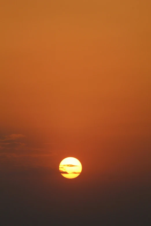 the sun is setting over a body of water, a picture, pexels, romanticism, digital yellow red sun, photos, sky setting, taken in the late 2000s