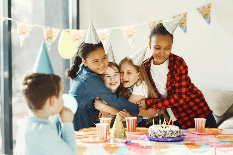 a group of children at a birthday party, by Elaine Hamilton, shutterstock, instagram post, 15081959 21121991 01012000 4k, sweet hugs, center focus on table