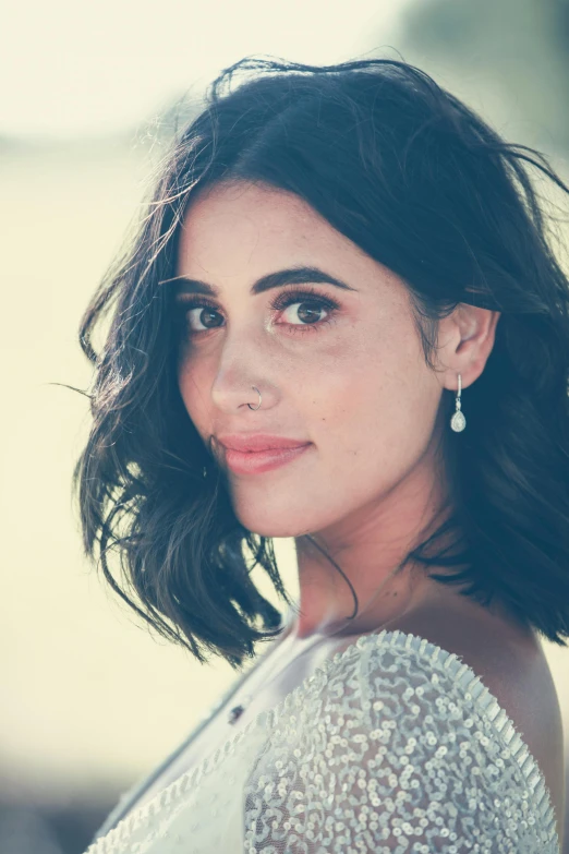 a close up of a person wearing a dress, an album cover, arabesque, ana de armas portrait, square, wedding, young middle eastern woman