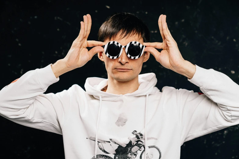 a man in a white hoodie and sunglasses, an album cover, inspired by Vladimir Novak, andrea savchenko, linus from linustechtips, high quality picture, dj