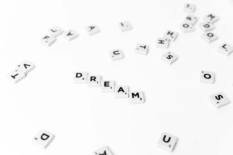 scrabbles spelling the words dream, dream, dream, dream, dream, dream, dream, dream, dream, dream, dream, by Caroline Mytinger, pexels, white minimalist architecture, dream scenery art, fantasy genre, skin