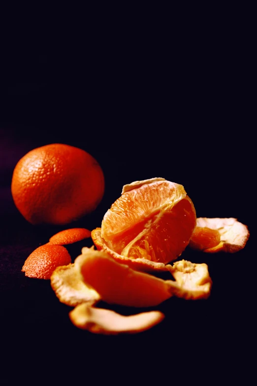 a close up of a peeled orange on a table, a still life, by David Simpson, pexels, 1999 photograph, made of glazed, chinese, nut