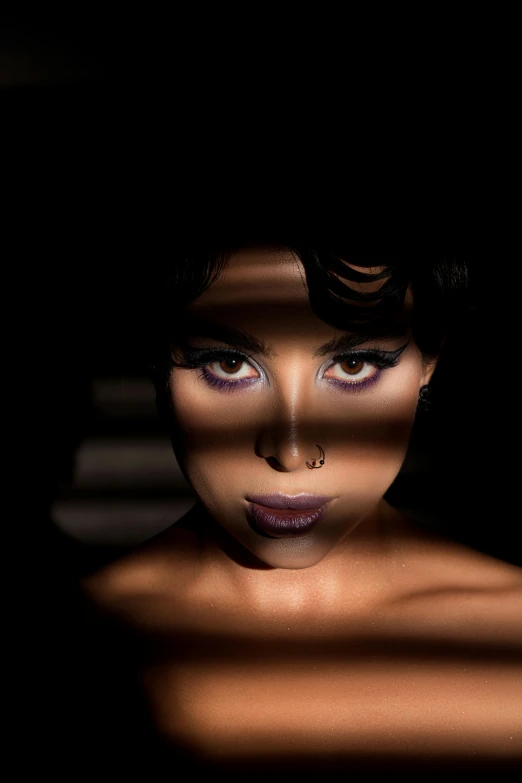 a close up of a woman's face in the shadows, an album cover, inspired by George Hurrell, harlem renaissance, dark purple skin, hyperrealistic ”