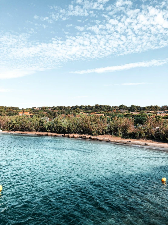 a large body of water next to a beach, mediterranean fisher village, summer vibes, thumbnail, slide show