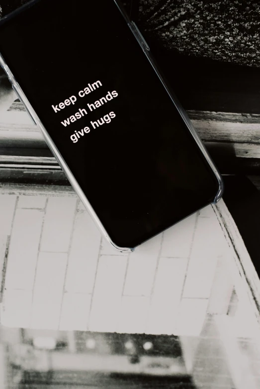 a cell phone sitting on top of a pile of papers, trending on pexels, graffiti, sweet hugs, 2 5 6 x 2 5 6, black, calm