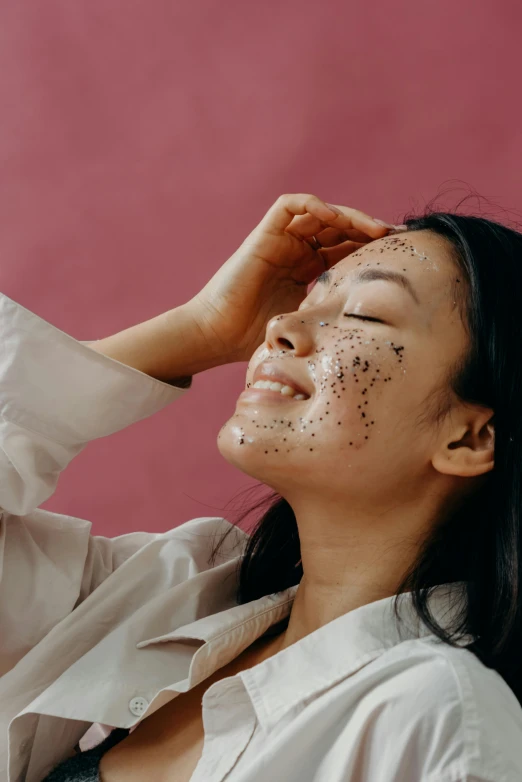 a woman with a lot of dirt on her face, trending on pexels, happening, made of dots, asian female, delightful, product shot