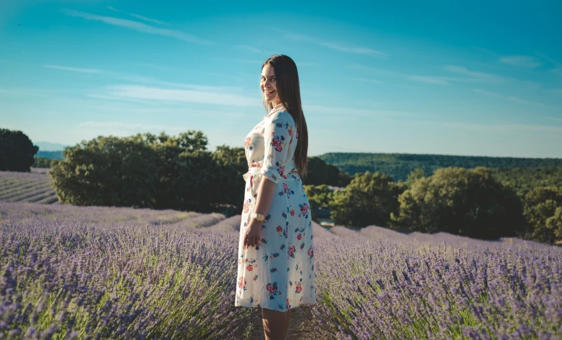 a woman standing in a lavender field, a portrait, inspired by Camille Corot, pexels contest winner, emma bridgewater and paperchase, evening sunlight, three - quarter view, maternal photography 4 k