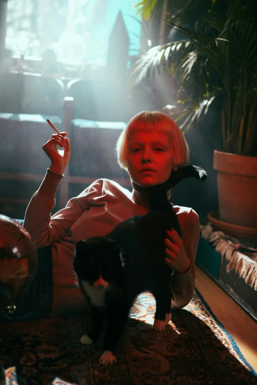 a woman sitting on the floor with a cat, an album cover, inspired by Elsa Bleda, trending on pexels, magic realism, smoking cigarette, girl with short white hair, russian cinema, in the style wes anderson