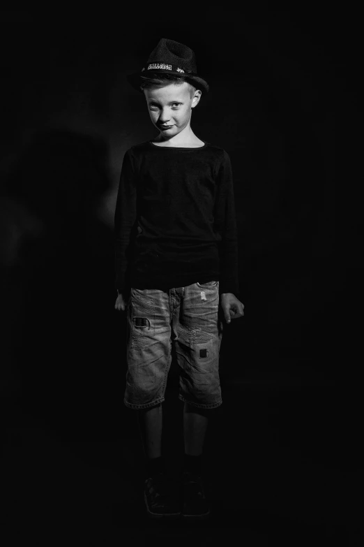 a little boy that is standing in the dark, inspired by Antanas Sutkus, antipodeans, emaciated shaved face, 15081959 21121991 01012000 4k, 14 yo berber boy, small black eyes