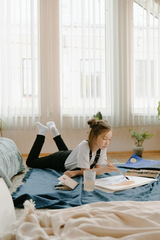 a girl laying on a bed reading a book, a child's drawing, pexels contest winner, carpeted floor, teenager hangout spot, gif, architect