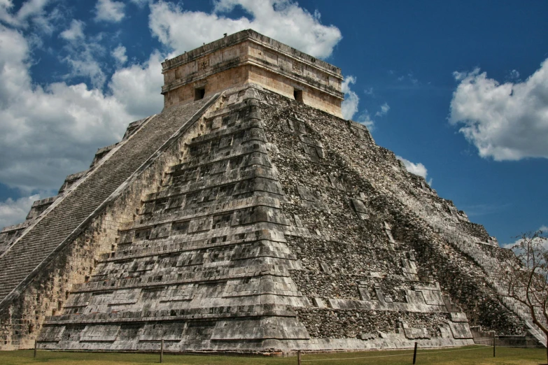 a tall pyramid sitting on top of a lush green field, by Tom Wänerstrand, pexels contest winner, renaissance, mayan style, background image, square, demolition