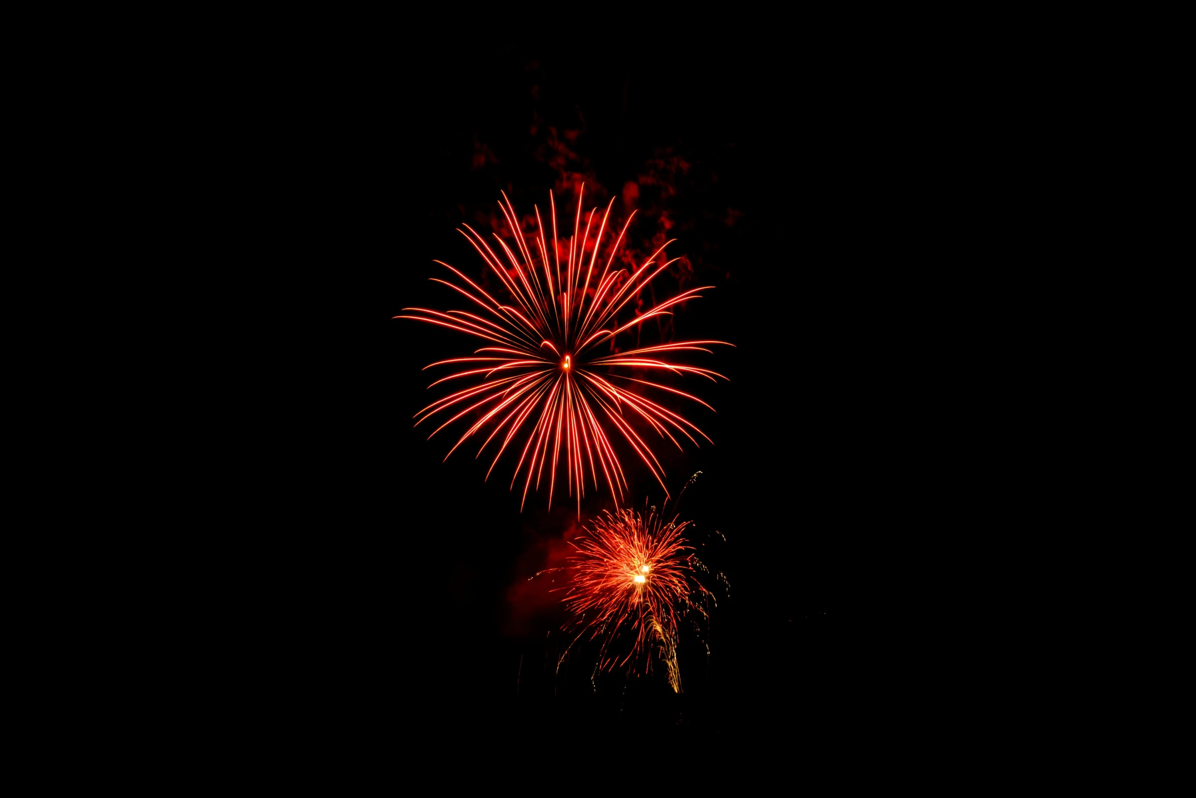 a firework is lit up in the dark, pexels, hurufiyya, volumetric lighting. red, celestial red flowers vibe, brown, feature