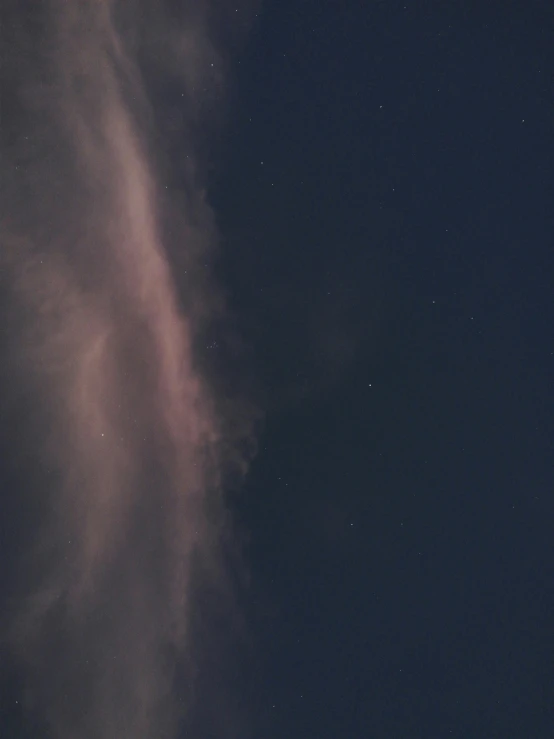 a jet that is flying through the air, by Attila Meszlenyi, light and space, ☁🌪🌙👩🏾, cloud nebula, telephoto long distance shot, muted colours 8 k