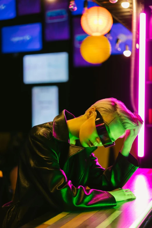 a woman sitting at a bar using a cell phone, an album cover, inspired by Elsa Bleda, trending on pexels, visual art, max headroom, neon lenses, cai xukun, sitting sad in spaceship