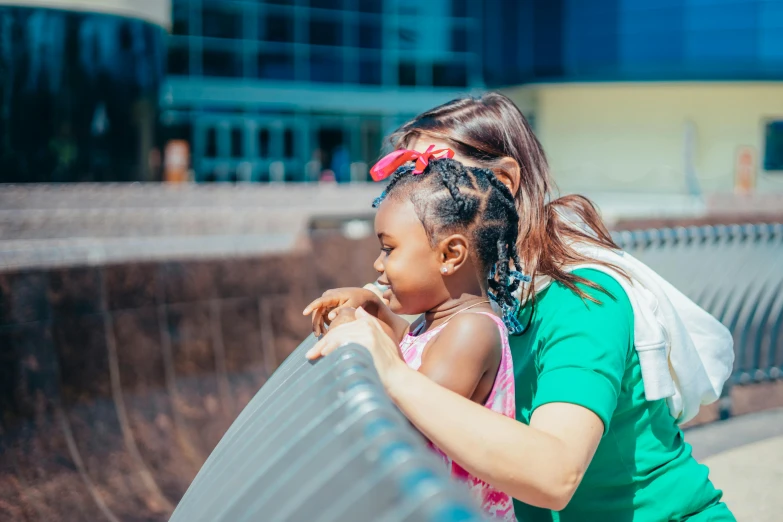 a woman and a little girl standing next to each other, pexels contest winner, symbolism, hot summer day, african american girl, cooling, 15081959 21121991 01012000 4k